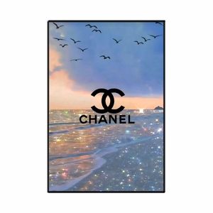 Chanel 11"x17" Framed Wall Art
